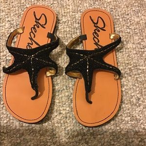 Skechers sandals, look of a starfish.